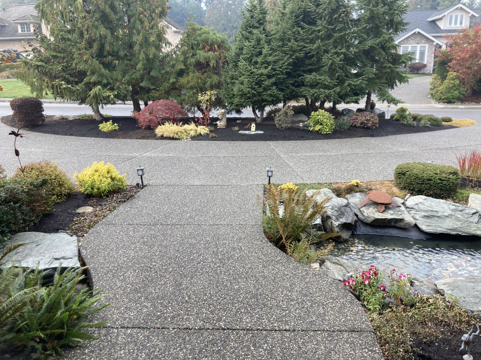 Yellow house with landscaping